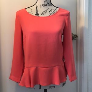 Pink peplum top
